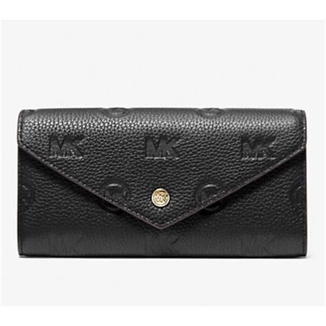 michael kors embossed envelopo|Jet Set Travel Large Logo Embossed Leather Envelope Wallet.